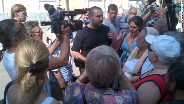 Separatist political leader Denis Kuzmenko speaks to supporters at a memorial for people who died in Mariupol, Ukraine, on May 9. He vowed Sunday not to let Ukrainian national authorities set up polling stations in his town for presidential elections next week.