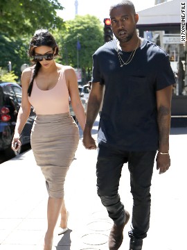 Before their May 24 wedding, lovebirds Kim Kardashian and Kanye West pretty much took over Paris. Here, the couple -- who often enjoy matching one another -- take a pre-wedding stroll in the City of Light on May 19. This moment's pretty kute, but how does it stack up against these other PDA-filled moments?