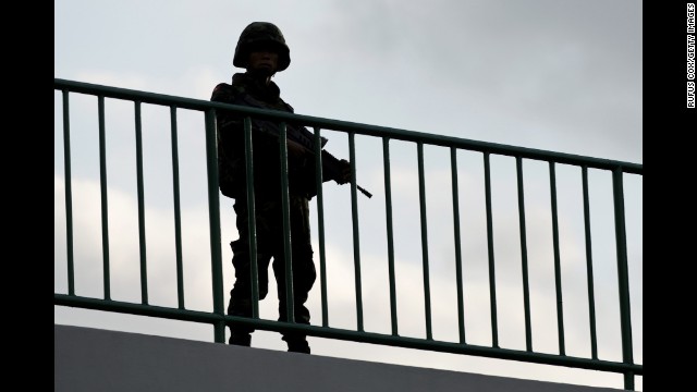 A soldier stands guard on Thursday, May 22, in Bangkok.