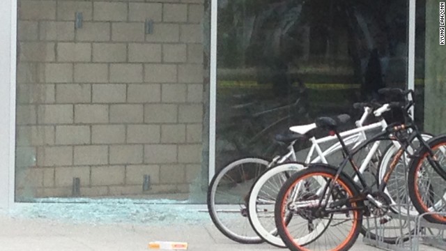 Broken glass at the shooting scene Saturday. Authorities said there were nine separate crime scenes. 