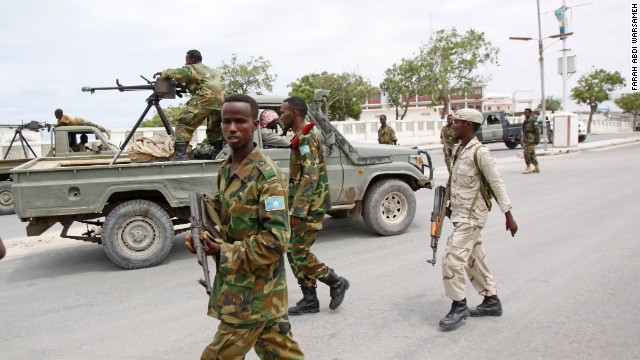 Somali government soldiers patrol the area during the attack.