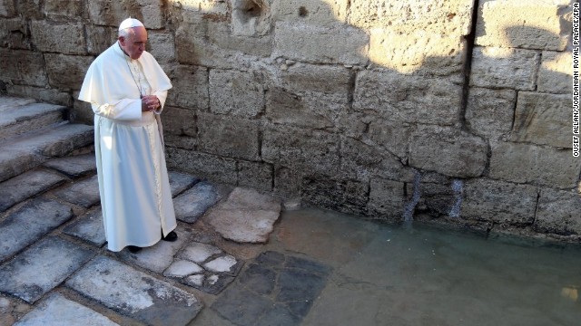 Pope Francis prays Saturday, May 24, at Bethany Beyond the Jordan, on a tributary of the Jordan River that tradition holds is the site where Christ was baptized. The Pope is visiting Jordan, Bethlehem and Jerusalem in an effort to promote unity.