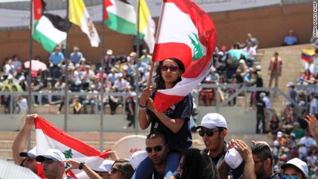 Jordanians and Christians of various nationalities and denominations congregate at Amman's International Stadium on May 24 awaiting the Pope's arrival.