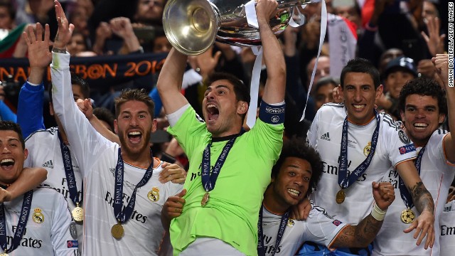Iker Casillas lifts the Champions League trophy after a 4-1 win for Real Madrid over Atletico in Lisbon. 