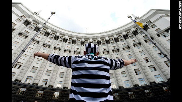 A man dressed in a prisoner costume takes part in a protest against government corruption May 27 in Kiev, Ukraine.