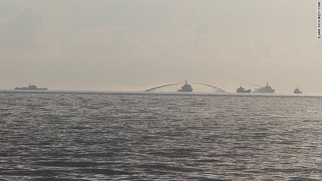 An image taken from a Vietnamese Coast Guard vessel shows a Chinese Coast Guard ship firing a water cannon at a Vietnamese fisheries research ship in disputed waters in the South China Sea on May 28.