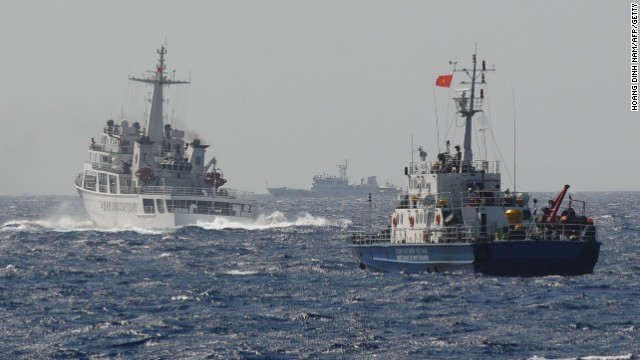 A Chinese Coast Guard vessel (left) appears to block a Vietnamese ship (right) near the area of China's oil drilling rig in disputed waters in the South China Sea on May 14. 