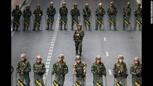 Thai soldiers guard a bus stop area to prevent an anti-coup demonstration in Bangkok on Thursday, May 29. 