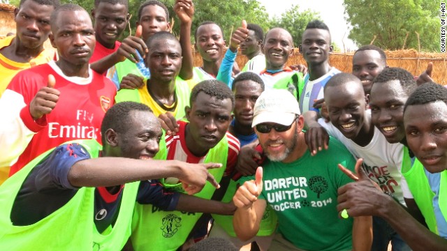 The Darfur players pose with i-ACT founder and executive director Gabriel Stauring ahead of the trip to Ostersund.