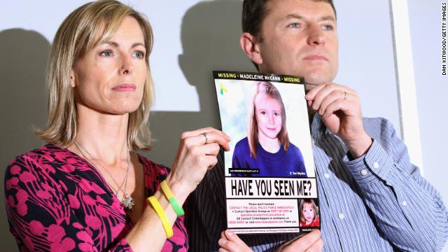 The McCanns hold an age-progressed police image of Madeleine during a May 2012 news conference to mark the fifth anniversary of her disappearance.