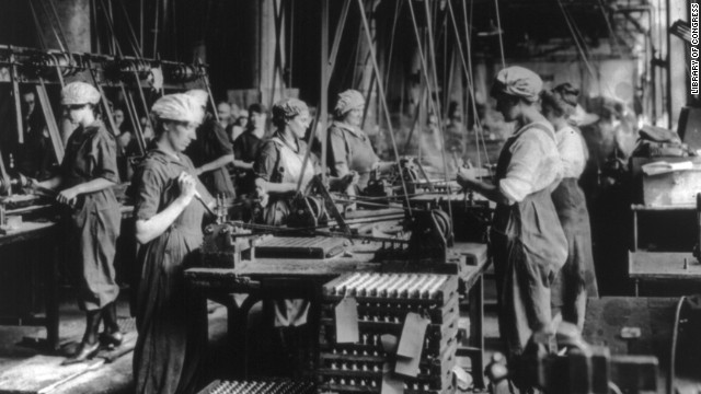 Women work at the Gray &amp; Davis Co. ordnance factory in Cambridge, Massachusetts. Munitions workers faced harsh working conditions that were sometimes lethal, such as in the Barnbow National Factory explosion that killed 35 near Leeds, England.