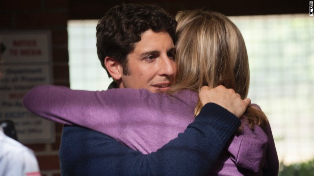 Jason Biggs plays Larry Bloom, a journalist and Chapman's (formerly) doting fiancé. He stood by her in season one even when the more sordid details of her past were revealed, but becomes increasingly disenchanted and eventually exploits her prison sentence to bolster his career.