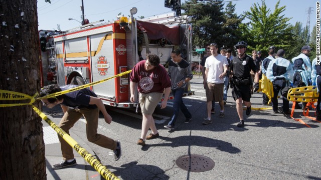 Seattle Pacific University students are led out of the crime scene.