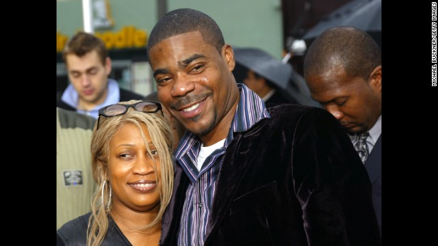 Actor Tracy Morgan and his wife Sabina pose on the red carpet during the premiere of "Are We There Yet?" at the Mann Village on January 9, 2005 in Los Angeles. The couple divorced in 2009 after 23 years of marriage. 