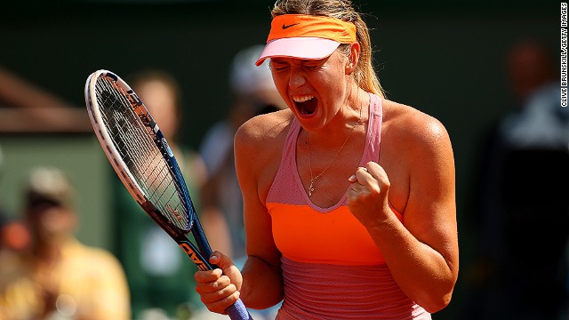 The Russian, who has featured in the last three French Open finals, celebrates as she seals the first set 6-4 in just under an hour.