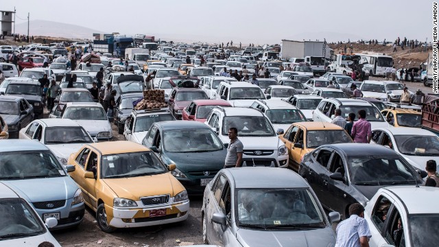 Photos: Iraqi civilians flee Mosul