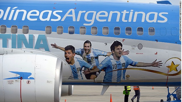 "Vamos Argentina" says the Aerolineas Argentinas Boeing 737. It also sports the I-just-scored-a-wondergoal expressions of Lionel Messi, Gonzalo Higuain and Sergio Aguero.