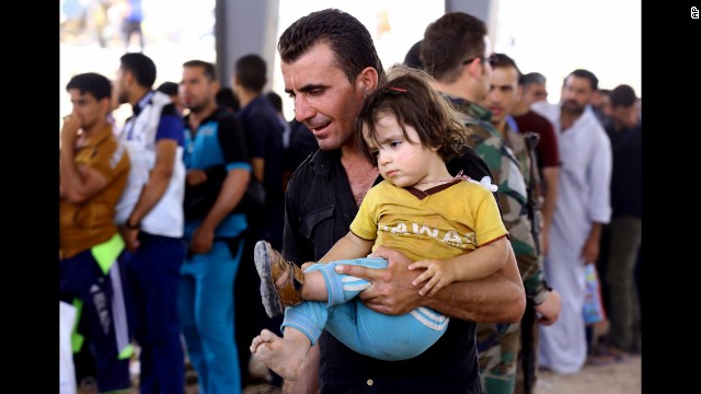 Civilians from Mosul escape to a refugee camp near Irbil on June 10. 