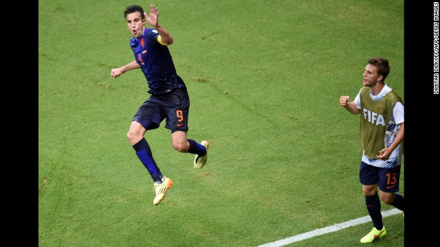 Netherlands forward Robin van Persie, left, celebrates after scoring his second goal of the match to put the Dutch up 4-1. 