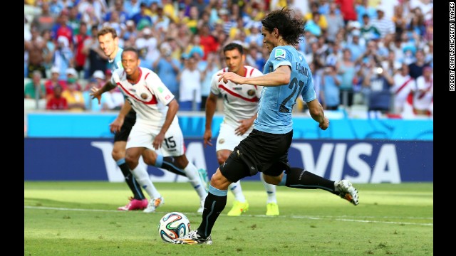 Edinson Cavani puts Uruguay ahead with a first-half penalty kick.