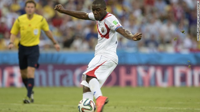 Forward Joel Campbell scores Costa Rica's equalizer against Uruguay.