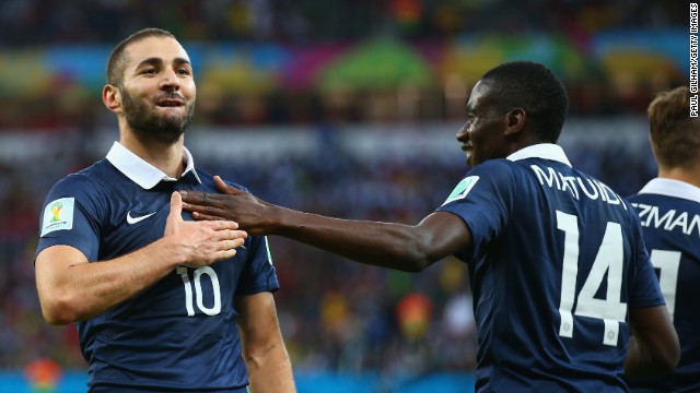 Karim Benzema, left, celebrates with teammate Blaise Matuidi after scoring France's third goal against Honduras on June 15. It was his second goal of the match, which France won 3-0 in Porto Alegre, Brazil.