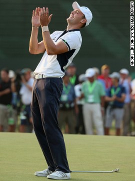 Martin Kaymer celebrates after securing the U.S. Open crown at Pinehurst by an incredible eight shots, becoming the first German to win the tournament in the process.