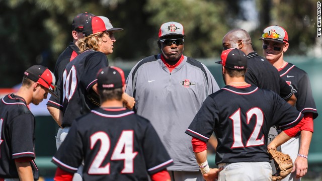 After retiring from baseball, Gwynn became head coach of the baseball team at his alma mater, San Diego State University. Here, he talks to the team during an NCAA tournament game in 2013.
