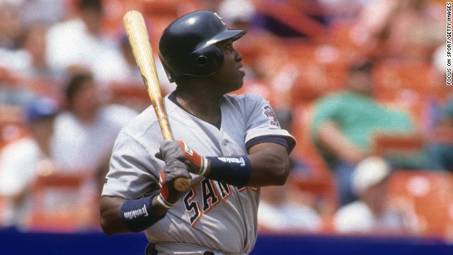 Gwynn watches the flight of a ball against the New York Mets in 1993. Gwynn finished his career with 3,141 career hits and a .338 batting average.