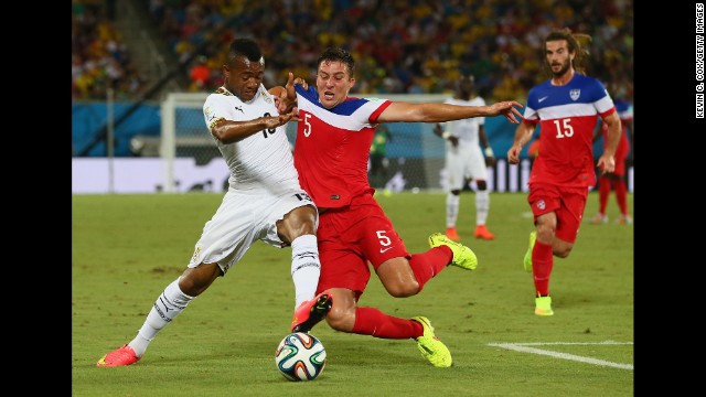 Besler, right, tries to win the ball from Jordan Ayew of Ghana.