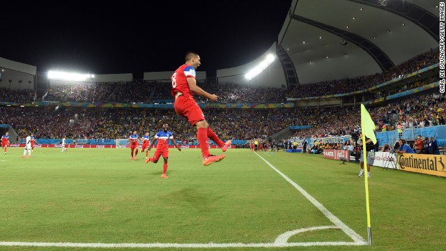 Dempsey celebrates after scoring against Ghana. His goal came in the first minute of the match.