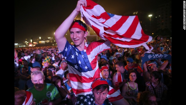 American soccer fans gather on Copacabana beach in Rio de Janeiro before the game.