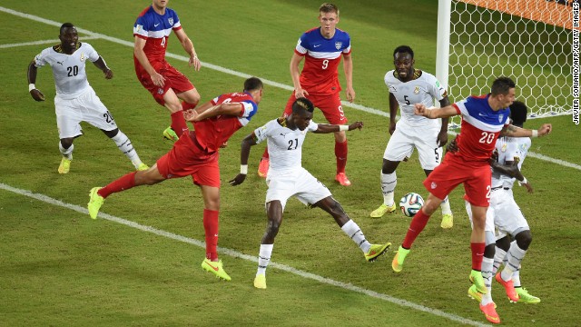 Brooks, third from left, directs his header down as he scores against Ghana. Brooks came into the game after halftime, as a substitute for an injured Matt Besler. With his goal, he became the first American sub to score in a World Cup.