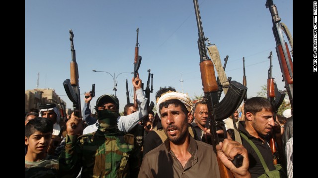 Iraqi tribesmen gather in Baghdad on Monday, June 16, to show their readiness to join Iraqi security forces in the fight against Islamic militants.