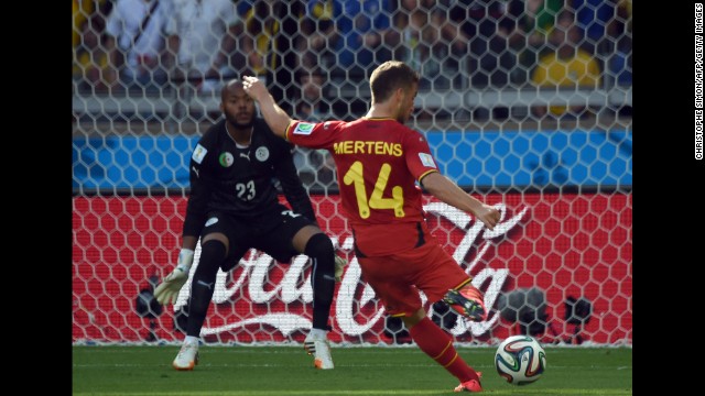 Belgium's Dries Mertens shoots what would turn out to be the winning goal during a World Cup match against Algeria on June 17 in Belo Horizonte, Brazil. Belgium won the match 2-1 after trailing 1-0 at halftime.