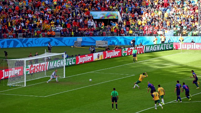 A penalty kick from Australian captain Mile Jedinak gives the "Socceroos" a 2-1 lead over the Netherlands. The penalty was awarded after a handball was called against Dutch defender Daryl Janmaat.