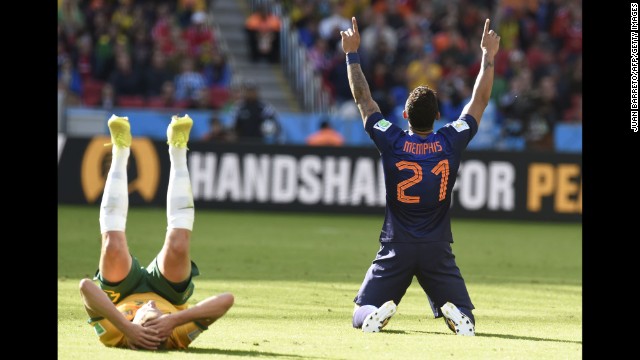 Netherlands forward Memphis Depay celebrates at the end of his team's World Cup match against Australia. Depay's second-half goal was the difference as the Netherlands won 3-2 in Porto Alegre, Brazil.