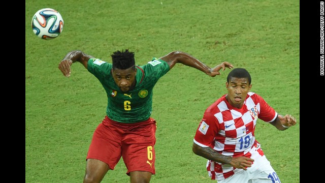 Cameroon's Alexandre Song vies for the ball with Croatia's Sammir.