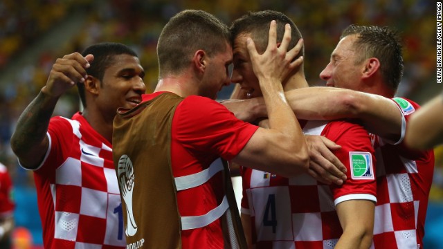 Ivan Perisic of Croatia, second from right, celebrates with teammates after scoring his team's second goal.