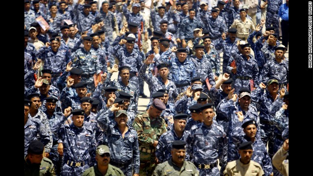 New Iraqi army recruits gather in Najaf on Wednesday, June 18, following a call for Iraqis to take up arms against Islamic militant fighters. 