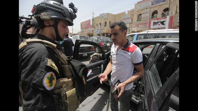 Soldiers with an Iraqi anti-terrorism unit are on guard June 18 in Baghdad.