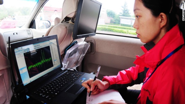 Radio signals are monitored and students are checked with scanners before and during the 2013 university entrance exams in China. The country has been pro-active in its attempts to crack down on high tech cheats. 