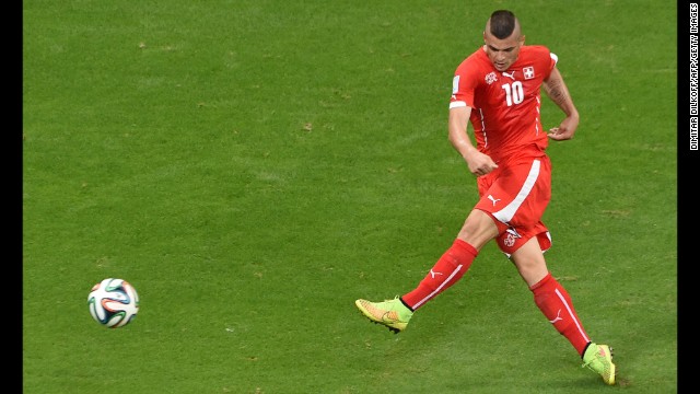 Switzerland midfielder Granit Xhaka scores on a volley in the second half against France on June 20. But France were well ahead by that point, winning 5-2 in Salvador, Brazil.