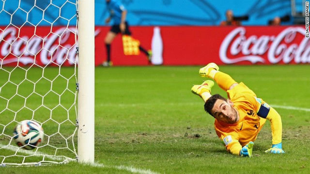 French goalkeeper Hugo Lloris can't get to a free kick from Switzerland's Blerim Dzemaili in the second half. France led 5-0 to that point.