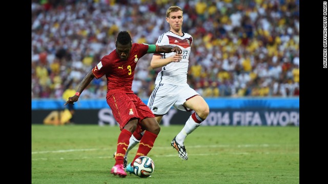 Asamoah Gyan of Ghana puts his team 2-1 head against Germany.