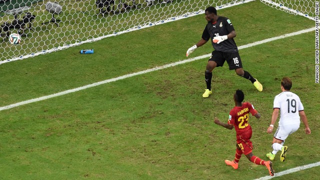 Germany midfielder Mario Gotze, right, scores the team's first goal against Ghana.