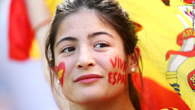 A Spain fan looks on prior to the match against Australia. See the best World Cup photos from June 22.