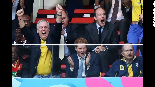 Prince Harry is seen in the stands celebrating Brazil's first goal shot by Neymar.