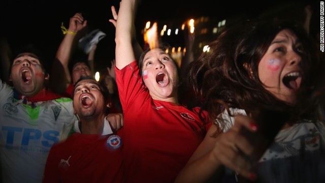 Fans in Rio de Janeiro react after Chile scored against Australia on Friday, June 13. Chile won the match 3-1.