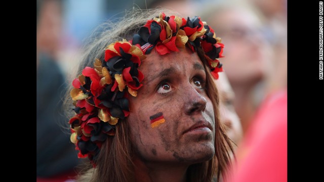 A fan of Germany watches from Berlin as Germany plays Ghana on June 21. The match ended 2-2.